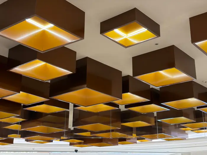 Modern ceiling with recessed gold-lined light fixtures